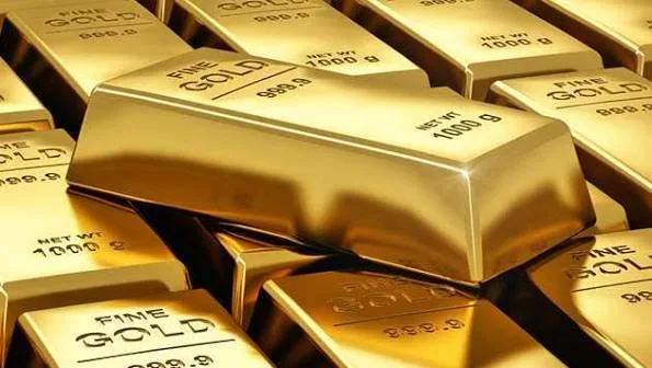 The popular read on gold is that its bull run is over: the metal sits near $4,192 an ounce as of June 22, 2026, roughly 22.8% below the $5,595.75 record it set on January 29, and a drawdown that deep usually marks a cycle top. That reading misses what the correction actually is. Gold is not topping — it is changing hands. The marginal seller is rate-sensitive Western capital reacting to a hawkish Federal Reserve and elevated real yields, while the marginal buyer is a price-insensitive bloc of emerging-market central banks that bought 244 tonnes in the first quarter of 2026 alone (World Gold Council). When the price-setter changes, the chart looks like a top while the floor is quietly rising.
That is the synthesis this piece develops, and it is the thing most bull-versus-bear gold coverage skips. The two-sided debate is usually framed as "central banks versus the Fed," as if one wins. The more useful frame is that gold now trades in two tiers at once: a cyclical, real-yield-driven layer that is in a genuine correction, sitting on top of a structural, de-dollarisation-driven bid that does not flinch at a $1,400 pullback. That is why the bears' $3,800 target keeps failing to print and why the banks' $5,400–$6,000 calls rest on demand that is structural, not a momentum trade. Understand the two tiers and the bull and bear cases stop contradicting each other.
<strong>Key Facts:</strong>
• Gold trades near $4,192/oz on June 22, 2026, about 22.8% below its January 29 record of $5,595.75 — <a href="https://www.litefinance.org/blog/analysts-opinions/gold-price-prediction-forecast/daily-and-weekly/">LiteFinance, June 2026</a>
• Central banks bought a net 244 tonnes in Q1 2026, up from 208 tonnes in Q4 2025 — <a href="https://goldsilver.com/industry-news/article/gold-price-forecast-2026-2027-key-predictions-from-top-analysts/">World Gold Council via GoldSilver</a>
• J.P. Morgan targets roughly $5,000–$6,300/oz for 2026 on central-bank demand — <a href="https://www.jpmorgan.com/insights/global-research/commodities/gold-prices">J.P. Morgan Research</a>
• Goldman Sachs lifted its December 2026 target to $4,900, citing structural central-bank demand — <a href="https://finance.yahoo.com/markets/commodities/articles/goldman-sachs-revisits-gold-price-194700449.html">Goldman Sachs via Yahoo Finance</a>
• UBS marks $5,200 (June), $5,400 (September) and $5,900 (December) 2026; Morgan Stanley cut its Q4 view to $5,200 — <a href="https://goldsilver.com/industry-news/article/gold-price-forecast-2026-2027-key-predictions-from-top-analysts/">GoldSilver, 2026</a>
• Near-term technical support sits at $4,005, resistance at $4,255 — <a href="https://www.litefinance.org/blog/analysts-opinions/gold-price-prediction-forecast/daily-and-weekly/">LiteFinance, June 22, 2026</a>
Quick Take
Gold's 22.8% fall from its January record is a real-yield correction layered over an intact central-bank bid. The bear case ($3,800–$3,900) needs the structural buyer to quit; the bull case ($5,400–$6,000) needs the Fed to ease. Base case for 2026 is a wide $3,900–$5,200 range, skewed higher because the floor is structural and the ceiling is cyclical.
What's actually happening, and why the drop isn't the top
Gold pays no yield. That single feature explains the correction: when real yields — the return on inflation-protected US Treasuries — rise, the opportunity cost of holding a metal that earns nothing goes up, and rate-sensitive money rotates out. With the Fed under new Chair Kevin Warsh holding rates high and signalling no rush to cut, real yields have stayed elevated through the first half of 2026, and that is the proximate cause of gold's slide from $5,595 to the low $4,000s.
But the model that governed gold for two decades — price tracks the inverse of US real yields — has broken down, and the break is the story. Through 2025 and into 2026, gold rose to records even as real yields climbed, a divergence that should not happen under the old framework. The explanation is demand that does not care about US opportunity cost: central banks in China, India, Turkey, Poland and the Gulf buying bullion to diversify away from dollar reserves. Think of it as two buyers at one auction — a hedge fund that bids only when rates fall, and a sovereign that bids every month regardless. The sovereign sets the floor; the hedge fund sets the swings. That divergence — gold making records while real yields rose — is the empirical break that signals the auction has a new dominant bidder, and it shows in the way recent peaks, including the run we documented when <a href="https://financefeeds.com/gold-price-hits-new-all-time-high/">gold hit fresh all-time highs</a>, held most of their gains instead of fully retracing.
That is why the current pullback behaves differently from past cycle tops. Gold remains the asset of choice during instability, and the structural bid has turned what used to be cyclical demand into a permanent feature, as our coverage of <a href="https://financefeeds.com/gold-climbs-to-new-record-levels/">gold's climb to record levels</a> traced through late 2025.
"We expect gold demand to push prices toward $5,000 per ounce by year-end 2026," said Natasha Kaneva, Head of Global Commodities Strategy at J.P. Morgan (<a href="https://www.jpmorgan.com/insights/global-research/commodities/gold-prices">J.P. Morgan Research</a>).
How the institutions are positioned
The sell-side has not abandoned gold despite the drawdown — if anything, the correction has firmed conviction in the structural case. J.P. Morgan's Natasha Kaneva carries the most aggressive year-end framing, with a $6,300 Q4 path built on projected central-bank purchases near 800 tonnes for 2026. Goldman Sachs lifted its December 2026 target to $4,900 and flagged further upside, while UBS lays out a rising quarterly ladder to $5,900 by December. Morgan Stanley is the cautious voice, having trimmed its Q4 target from $5,700 to $5,200 on elevated real yields and delayed Fed cuts — notably, a "cut" that still sits well above spot.
The tell is that even the bearish bank revision lands above the current price. When the most cautious major-bank target is a 24% premium to spot, the institutional debate is about how high, not whether. That stands in contrast to the retail-driven momentum that characterised earlier gold rallies, and it is the dynamic we examined in our <a href="https://financefeeds.com/gold-price-prediction-bull-bear-cases-2026/">$3,800–$6,300 bull and bear case breakdown</a>. Central banks, for their part, have not commented on price at all — they buy on policy mandates, not technicals, which is precisely why their bid is so stable.
"There is significant upside risk to the forecast," said Lina Thomas, Senior Commodities Analyst at Goldman Sachs, citing strong structural demand from central banks (<a href="https://finance.yahoo.com/markets/commodities/articles/goldman-sachs-revisits-gold-price-194700449.html">Goldman Sachs via Yahoo Finance</a>).
The numbers, mapped: bull, base and bear
Combining the flow data with the analyst ladder produces a cleaner scenario map than any single target. The central-bank tonnage sets the structural floor; the Fed path sets the cyclical ceiling. Crucially, the gap between the bear's $3,800 and the bull's $6,000 is not a single variable — it is two independent ones, which is why a probability-weighted view beats a point forecast.
Scenario2026 targetTriggerRough probability
<strong>Bear</strong>$3,800–$3,900Real yields rise further; central-bank buying slows; break of $4,005 support~25%
<strong>Base</strong>$4,500–$5,200Range-bound; central-bank bid intact; Fed holds without hiking~50%
<strong>Bull</strong>$5,400–$6,000Fed pivots to cuts; geopolitical shock; tonnage accelerates toward 800t~25%
<em>Sources: J.P. Morgan; Goldman Sachs; UBS; Morgan Stanley; World Gold Council, all 2026, via <a href="https://goldsilver.com/industry-news/article/gold-price-forecast-2026-2027-key-predictions-from-top-analysts/">GoldSilver</a>. Probabilities are this author's synthesis of the cited ranges.</em>
A pros/cons split makes the two-tier market explicit:
The bull case for goldThe bear case for gold
Central banks bought 244t in Q1 2026, a structural, price-insensitive bidElevated US real yields raise the opportunity cost of a non-yielding asset
Even the most cautious bank target ($5,200) is ~24% above spotA hawkish Warsh Fed has delayed the rate cuts gold needs to re-rate
De-dollarisation is a policy response tightening cannot reverseA 22.8% drawdown can self-reinforce if momentum funds keep selling
Geopolitical risk premia keep the safe-haven bid liveIf tonnage slows below the Q1 pace, the floor drops with it
<em>Synthesis of cited bank and World Gold Council data, June 2026.</em>
The asymmetry is the point. A bear case to $3,900 is roughly a 7% downside from spot; a bull case to $6,000 is a 43% upside. That skew exists because the downside is capped by a buyer who does not sell, while the upside is geared to a Fed pivot that the market has not yet priced. For brokers and liquidity desks, that argues for treating gold dips as supported rather than as the start of a trend reversal — the mirror image of how the 2013–2015 bear market behaved, when no structural bid existed beneath the price.
The macro and policy tension
Gold sits at the intersection of two forces pulling in opposite directions. On one side, the Federal Reserve's hawkish hold under Warsh keeps real yields elevated, the textbook headwind for a non-yielding asset; the goldsilver.com analysis of the Warsh hearing framed the new Chair as a near-term negative for bullion. On the other, the structural driver — de-dollarisation by emerging-market central banks — is itself a response to the perceived weaponisation of the dollar through sanctions, a policy dynamic that monetary tightening cannot reverse.
That tension is not resolvable by either side winning outright; it is a standoff that produces a wide trading range rather than a clean trend. The regulatory and geopolitical overlay matters too: sanctions regimes, reserve-diversification mandates at institutions such as the People's Bank of China, and Middle East risk premia all feed the sovereign bid independent of what the Fed does. Western investors watch the Fed; sovereign reserve managers watch Washington's willingness to freeze assets. Those are different clocks, and gold is the asset caught between them — which is exactly why its 2026 path is a range, not an arrow.
The jurisdictional spread of the bid matters because it makes the demand resilient to any single country pausing. China has resumed reporting additions to its reserves after long opaque stretches; Poland's central bank has been among Europe's most aggressive accumulators; and Gulf and emerging-Asia institutions continue to lift allocations as a sanctions hedge. No single regulator governs this — it is a diffuse, mandate-driven shift across dozens of reserve managers, which is why the World Gold Council's quarterly survey, not any one policy meeting, is the most reliable forward indicator. The contrast with the Fed is stark: one institution sets the cyclical headwind, but no institution can switch off the structural bid, and that institutional asymmetry is the core reason the bear case is shallower than a 22.8% drawdown would normally imply.
What happens next — predictions
First, expect gold to hold a $3,900–$5,200 range for most of 2026, with $4,005 the line that defines whether the correction deepens; a weekly close below it opens the bear case, while it holding turns the level into a launchpad. Second, the decisive catalyst is the Fed: the first genuine signal of rate cuts should pull rate-sensitive Western money back in and put the $5,400 bank targets in play within two quarters. Third, watch the World Gold Council's quarterly tonnage — if central-bank buying holds near or above the 244-tonne Q1 pace, the structural floor rises with each report, and the bear case erodes mechanically.
The honest forecast is conditional: gold is a two-tier market, and the cleanest tell is not the chart but the divergence between real yields and price. As long as that divergence persists, dips are accumulation zones for the sovereign bid, and the burden of proof sits with the bears. We will track the tonnage data and the Fed path as both develop.
Frequently asked questions
<strong>What is a realistic gold price for 2026?</strong>
The grounded 2026 range is roughly $3,800 in the bear case to $6,000 in the bull case, with a $4,500–$5,200 base case. Major banks cluster their year-end targets between $4,900 (Goldman) and $6,300 (J.P. Morgan), all above the current $4,192 spot.
<strong>Why did gold fall from its record high?</strong>
Gold dropped about 22.8% from its January 29, 2026 record of $5,595.75 primarily because elevated US real yields under a hawkish Federal Reserve raised the opportunity cost of holding a non-yielding asset, prompting rate-sensitive investors to rotate out.
<strong>Are central banks still buying gold?</strong>
Yes. Central banks bought a net 244 tonnes in the first quarter of 2026, up from 208 tonnes in the prior quarter, according to the World Gold Council. This structural demand is the main reason the bearish $3,800 scenario has struggled to materialise.
<strong>What would push gold to $6,000?</strong>
A clear Federal Reserve pivot to rate cuts, a fresh geopolitical shock, or an acceleration in central-bank purchases toward J.P. Morgan's projected 800 tonnes for 2026. The bull case is geared to the Fed easing, which markets have not yet priced.
<strong>What would invalidate the bullish case?</strong>
A weekly close below $4,005 support, a further rise in real yields, or a slowdown in central-bank buying would each undercut the structural thesis and put the $3,800–$3,900 bear range in play.
<strong>Why has gold stopped tracking US real yields?</strong>
For two decades gold moved inversely to inflation-adjusted Treasury yields. That link broke in 2025–2026 as central-bank buying became the dominant marginal demand. Sovereign reserve managers purchase on diversification mandates, not opportunity cost, so their bid persists even when real yields rise — decoupling price from the old model.
<strong>Is gold still a hedge if the Fed stays hawkish?</strong>
Partly. A hawkish Fed and high real yields cap gold's upside and can drive corrections like the 22.8% fall from January's record. But the structural central-bank bid and geopolitical risk premia keep a floor under the price, which is why even Morgan Stanley's cautious $5,200 Q4 2026 target sits above the current $4,192 spot.
<strong>How does gold compare with Bitcoin as a 2026 reserve hedge?</strong>
They are diverging. Gold's bid is sovereign and policy-driven, so it has held a structural floor through 2026's risk-off stretch, whereas Bitcoin has tracked macro risk appetite more closely and sold off harder. For reserve managers diversifying away from the dollar, gold remains the institutional default; Bitcoin is still treated as a higher-beta allocator instrument rather than a sovereign reserve asset.