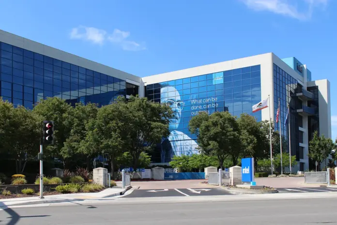 Intel reported an $11.0bn net loss in its second quarter of 2026 and the business was not losing money. Those two statements are both true, and the reconciliation between them is the single most misunderstood number in large-cap semiconductors. Intel closed at <strong>$95.80</strong> on 4 September 2026, up 4.51%, having risen roughly 289% over twelve months from a low of $24.08. The loss that dominates every summary of the company is driven by a <strong>$13.6bn non-cash mark-to-market charge on Escrowed Shares</strong> - Intel stock held in escrow for the US Department of Commerce - and that charge is measured in Intel's own equity. It therefore gets <em>larger</em> when the share price goes up. Intel is the only company of its size where a rally mechanically manufactures a bigger reported loss.
This is not a technicality worth a footnote. It inverts the normal relationship between share price and reported earnings, and it will keep doing so. Intel traded at $87.48 in late August. It is $95.80 now. Everything else equal, that 9.5% appreciation makes the next quarter's escrow charge bigger than the last one, which means the next set of headlines will describe a larger GAAP loss produced in part by the stock having gone up. Anyone screening on reported earnings, and any model that treats the loss as an operating result, is reading Intel's equity appreciation as though it were business deterioration. The figure sits in plain sight in the company's own cash-flow reconciliation, added straight back as a non-cash item.
Key facts
Intel closed at <strong>$95.80</strong> on 4 September 2026, up 4.51%, and 32.0% below its 52-week closing high of $140.94 - <a href="https://stockanalysis.com/stocks/intc/">stockanalysis.com daily closes</a>, retrieved 5 September 2026
Second-quarter revenue was <strong>$16.13bn</strong>, up from $13.65bn a year earlier, with gross profit of $6.51bn for a gross margin of <strong>40.4%</strong> - <a href="https://www.sec.gov/Archives/edgar/data/50863/000005086326000155/q226earningsrelease.htm">Intel Q2 2026 results, 23 July 2026</a> (margin is a FinanceFeeds calculation)
GAAP net loss was <strong>$11.03bn</strong>, of which <strong>$13.62bn</strong> is a non-cash mark-to-market loss on Escrowed Shares, listed as an add-back in the cash-flow reconciliation against <strong>nil</strong> in the prior-year period - same filing
Restructuring and other charges were <strong>$3.97bn</strong> in the period, against $382m a year earlier - same filing
Research and development ran <strong>$3.37bn</strong>, equal to 20.9% of revenue - Intel Q2 2026 Form 10-Q, filed 24 July 2026 (FinanceFeeds calculation)
Intel has approximately <strong>5,044 million shares outstanding</strong>, for a market capitalisation of roughly <strong>$483bn</strong> at the 4 September close - Q2 2026 Form 10-Q cover, FinanceFeeds calculation
The company has removed roughly <strong>39,700 people in two years</strong> - see our <a href="https://financefeeds.com/intel-is-down-39700-people-in-two-years/">analysis of Intel's headcount reduction</a>
What the escrow charge actually is
Under Intel's arrangements with the US government tied to CHIPS Act support, a block of Intel shares sits in escrow for release to the Department of Commerce. Because the obligation is settled in Intel's own stock and carried at fair value, it behaves as a liability that tracks the share price. When Intel's equity appreciates, the value of what Intel owes appreciates with it, and the increase runs through the income statement as a loss.
The mechanics are visible in the primary filing rather than inferred. In the reconciliation from net loss to cash provided by operating activities, Intel adds back a line reading "Mark-to-market (gains) losses on Escrowed Shares" of <strong>13,619</strong>, in millions of dollars, against a blank for the same period a year earlier. An add-back in that statement is the accounting definition of a charge that consumed no cash.
Two consequences follow. The first is that Intel's GAAP earnings are, for now, an unreliable guide to the operating business, and the gap is not small or seasonal - it is larger than the loss itself. The second is directional and easy to miss: because the charge scales with the share price, the better the equity performs, the worse the reported number looks. That relationship holds until the escrowed shares are released, and it means Intel's headline results and its shareholder outcomes will keep pointing in opposite directions.
None of this makes the operating business good. It makes it separately assessable, which is the necessary first step.
What the operating business actually did
Revenue of $16.13bn was up from $13.65bn a year earlier, and management framed the quarter as an execution beat. "We delivered a strong second quarter, exceeding our financial guidance on robust demand and improved execution, including volume upside driven by higher factory yields and improved cycle times," said <strong>Dave Zinsner, Intel chief financial officer</strong>, in the results release.
Higher factory yields is the phrase that matters for a company whose central problem for half a decade has been manufacturing. Yield is the variable that converts Intel's enormous fixed-cost base from a liability into leverage, because the fabs are already built and paid for. Gross margin of 40.4% remains far below the company's historical peak and far below what a healthy foundry-plus-products business should generate, but the direction is the argument.
<strong>Lip-Bu Tan, Intel chief executive</strong>, positioned the company against the demand cycle rather than against a specific competitor: "AI is driving unprecedented demand for compute, and as we continue to execute, Intel is well-positioned to capture sustainable growth across our CPU franchise, ASICs, advanced packaging and vast wafer foundry network."
Note what is being sold there. Not a GPU roadmap. A CPU franchise, custom ASIC work, advanced packaging and foundry capacity. That is a deliberate repositioning away from competing head-on with <a href="https://financefeeds.com/nvidia-nvda-stock-prediction-340-bull-135-bear/">Nvidia</a> on accelerators and toward being infrastructure that other designers use. Whether the market pays for that is the entire Intel question.
Zinsner also flagged the cost of it: Intel is "meaningfully increasing our investments in equipment, clean room space, and substrates" to support expected growth this year and next. Restructuring and other charges of $3.97bn in the quarter, against $382m a year earlier, show the other side of the same reshaping.
Three companies, one cycle, three positions in the value chain
Intel's 40.4% gross margin is best understood next to its peers this quarter, because the three of them map the AI supply chain from end to end.
CompanyLatest gross marginPosition in the chain
<a href="https://financefeeds.com/micron-mu-stock-prediction-1500-bull-560-bear/">Micron</a><strong>84.6%</strong>Supply-constrained memory; sets price
<a href="https://financefeeds.com/amd-stock-prediction-700-bull-310-bear/">AMD</a><strong>54% GAAP</strong>Fabless designer; pays memory, pays TSMC
Intel<strong>40.4%</strong>Designs and manufactures; carries the fabs
The pattern is not about competence. It is about scarcity. Micron earns the highest margin because memory supply is the binding constraint in this cycle and only three companies can relieve it. AMD sits in the middle, capturing design value while paying the memory tax. Intel earns the least gross margin of the three and is the only one that must also fund fabrication out of that margin.
That is the bear case in one table, and it is also the bull case. Owning the fabs is what compresses Intel's margin today and what makes it the only Western company that could supply leading-edge capacity to everyone else if the industry decides concentration in Taiwan is a risk it can no longer carry. The same asset is the drag and the option.
The depreciation line is the real constraint
There is a number in Intel's cash-flow statement that explains the gross margin better than any commentary about competitiveness. Depreciation in the quarter was <strong>$5.89bn</strong>. Against revenue of $16.13bn, that is <strong>36.5% of every dollar of revenue</strong> consumed by the amortised cost of plant Intel has already built (FinanceFeeds calculation from the Q2 2026 results).
That single line is the difference between Intel and a fabless designer. AMD's cost base scales with what it buys from TSMC; if demand falls, its purchases fall. Intel's does not. The fabs depreciate on schedule whether or not wafers move through them, which is why utilisation, not pricing, is the dominant variable in Intel's margin and why yield improvements translate so directly into profit.
It also explains why the company can post a 40.4% gross margin and still generate substantial operating cash flow: depreciation is a non-cash charge, so a large share of what depresses reported margin is added back before cash is measured. Intel's cash generation has always looked materially better than its earnings, and in a period when its earnings also carry a $13.6bn non-cash equity charge, the divergence between the two is about as wide as it has ever been for a company this size.
The forward risk is that Zinsner's "meaningfully increasing our investments in equipment, clean room space, and substrates" adds to that fixed base. New capacity raises future depreciation before it raises revenue. If the AI demand Tan describes arrives on schedule, that timing gap is a rounding error. If it slips by a year, the depreciation lands first and the margin gets worse before it gets better.
The sovereign shareholder changes the risk shape
Intel is now partly owned by the state that regulates it, and that is a genuinely different kind of security to analyse. A government shareholder is a backstop against the disaster scenario, which is why Intel's downside is arguably better protected than any peer's. It is also a constituency with objectives that are not shareholder returns: domestic capacity, employment, supply-chain security.
Those objectives usually argue for building more fabs in more places than a purely commercial operator would choose, and for building them on a timetable set by politics. Investors buying Intel for the foundry option are buying a business whose capital allocation has a second decision-maker. In a downturn that is protection. In an upturn it is a ceiling on returns on capital.
The escrow charge is the visible accounting expression of that relationship, and it will remain in the numbers until the shares are released.
What happens next
<strong>First, expect the GAAP loss to persist or grow while the stock does well.</strong> This is arithmetic, not forecasting. If Intel's shares appreciate over the next quarter, the escrow charge grows and the reported loss widens. The signal to watch is non-GAAP earnings and operating cash flow, and the risk is that headline-driven selling on a "wider loss" print creates a gap between the reported number and the business.
<strong>Second, gross margin is the scoreboard for the manufacturing turnaround.</strong> Zinsner attributed the quarter's upside to higher factory yields and improved cycle times. If that is durable, it shows up as gross margin climbing from 40.4% toward the mid-forties over the coming quarters, with no change in revenue required. If margin stalls near 40% while capital spending rises, the turnaround thesis weakens regardless of what revenue does.
<strong>Third, the foundry proof point is an external customer at leading edge.</strong> Tan's framing rests on a "vast wafer foundry network" serving other designers. The market will not pay for that until a named, high-volume external customer commits publicly. Until then Intel is valued as a products company with a very expensive manufacturing arm, and the fabs are counted as a cost rather than an asset.
Our numbers: bull <strong>$150</strong>, base <strong>$112</strong>, bear <strong>$55</strong>, against a spot of $95.80. What would change our mind on the bull case is a second consecutive quarter of flat gross margin alongside rising capital expenditure, which would suggest the yield improvement was a mix effect rather than a process win. What would change our mind on the bear case is a leading-edge foundry commitment from a customer with real volume, which would re-rate the fabs from cost centre to strategic asset overnight. For the manufacturing benchmark Intel is measured against, our <a href="https://financefeeds.com/tsmc-tsm-stock-prediction-610-bull-case-vs-265-bear-case/">TSMC analysis</a> sets out what a fully utilised leading-edge foundry actually earns.
Frequently asked questions
<strong>Why did Intel report an $11bn loss if the business is improving?</strong>
Because $13.62bn of non-cash mark-to-market loss on Escrowed Shares runs through the income statement. The shares are held in escrow for the US Department of Commerce and are carried at fair value, so the obligation grows with Intel's share price. It appears as an add-back in Intel's cash-flow reconciliation, which is the accounting confirmation that it consumed no cash.
<strong>Does the escrow charge get bigger if Intel stock rises?</strong>
Yes. Because the liability is measured in Intel's own equity, appreciation in the share price increases the value of what Intel owes and produces a larger charge. This is why Intel's reported results and its shareholder outcomes can move in opposite directions, and it persists until the escrowed shares are released.
<strong>What is Intel's gross margin and how does it compare?</strong>
Gross margin was 40.4% in the second quarter of 2026, calculated from gross profit of $6.51bn on revenue of $16.13bn. That compares with 54% GAAP at AMD and 84.6% at Micron in their most recent quarters. Intel earns the least of the three and is the only one funding leading-edge fabrication from that margin.
<strong>What would make Intel's foundry business worth something?</strong>
A named external customer committing high volume at the leading edge. Chief executive Lip-Bu Tan describes a "vast wafer foundry network" as central to the strategy, but the market currently prices Intel's fabs as a cost rather than an asset, and only a credible third-party commitment changes that.
<strong>How much has Intel stock risen over the past year?</strong>
Intel closed at $95.80 on 4 September 2026 against a 52-week low of $24.08, an increase of roughly 289%. The shares nonetheless remain 32.0% below their 52-week closing high of $140.94.
<em>This article is analysis and information, not investment advice. Scenario levels are the author's estimates based on company filings and are not price targets or recommendations. Trading and investing carry risk, including the total loss of capital. Figures were verified against primary sources on 5 September 2026 and may have moved since.</em>