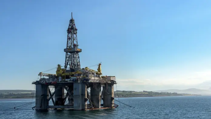 <strong>Updated 14 September 2026.</strong> Brent crude traded at <strong>$106.69</strong> a barrel, up $2.08 or 1.99% on the day, with WTI at <strong>$102.00</strong>, up 1.95% (Trading Economics, 14 September). Gulf News quoted the November Brent contract at $107.54, up 2.8%, in its 14 September report.
<strong>Verdict:</strong> the one event this week that could have pulled the geopolitical premium out of crude was the GCC-Iran meeting on Strait of Hormuz shipping. Oman postponed it. Crude went up, not down.
Key facts
Brent was quoted at <strong>$106.69</strong> a barrel on Monday 14 September, up $2.08 (1.99%); WTI was at <strong>$102.00</strong>, up 1.95% (Trading Economics, 14 September).
Gulf News, in a 14 September report last updated 08:24, quoted <strong>Brent for November delivery at $107.54</strong>, up 2.8%, and <strong>WTI for October at $102.34</strong>, up 2.3%. It put early Monday trade at Brent $104.60 and WTI $100.00.
Oman <strong>postponed</strong> the GCC-Iran meeting on managing shipping through the Strait of Hormuz that had been due in Salalah.
Omani Foreign Minister Badr Albusaidi said the postponement was "to ensure appropriate conditions for constructive dialogue that can help achieve sustainable understandings, support regional security and stability."
Iran's foreign ministry said the meeting was postponed "at the request of some regional countries."
Saudi Arabia's <strong>East-West Crude Oil Pipeline remains shut</strong> after drone strikes on 10-11 September. The Saudi foreign ministry said the pipeline was targeted in the Riyadh and Medina areas by "several drones originating from Iraq."
Trading Economics described Brent as rising "toward $108 a barrel, a 4-month high, after rallying over 9% last week."
The story on Monday was the meeting that did not happen
For the past week every fresh move in crude has come from an escalation: the Houthi advance on Mocha, the seizure of Perim Island at the mouth of the Bab el-Mandeb, and the drone strikes that shut Saudi Arabia's main pipeline workaround. Monday was supposed to be the first test of the other direction.
Gulf Cooperation Council foreign ministers were due to sit down with their Iranian counterpart in Salalah to discuss a temporary arrangement for managing shipping through the Strait of Hormuz. That meeting did not take place. Oman postponed it, with Omani Foreign Minister Badr Albusaidi framing the delay as an effort to "ensure appropriate conditions for constructive dialogue that can help achieve sustainable understandings, support regional security and stability." Iran's foreign ministry said the postponement came "at the request of some regional countries."
The distinction matters for anyone pricing crude this week. A postponement is not a collapse in talks, and both sides were careful to leave the door open. But it removes the only scheduled near-term catalyst that could have justified taking risk premium out of the barrel, and the market repriced accordingly within hours.
Why crude rose on a diplomatic delay
Oil had already spent the previous week climbing on supply-route risk. What made Monday different is that the market had been carrying a small discount in anticipation of the Salalah meeting. When the meeting slipped, that discount came back out.
The structural problem behind the headline has not changed. Iran has effectively shuttered the Strait of Hormuz, and Saudi Arabia had responded by rerouting roughly 5 million barrels a day through the 1,200 km East-West pipeline to the Red Sea port of Yanbu. The 10-11 September drone strikes took that alternative offline. Two of the three routes a Gulf barrel can take to market are therefore constrained at the same time, and the third, the Bab el-Mandeb, is the one the Houthis have spent the last week advancing on. We covered the Perim Island seizure and what it does to strait control in <a href="https://financefeeds.com/crude-oil-price-perim-island-houthi-strait-control-saudi-pipeline/">our 12 September piece on the Perim Island advance and the Saudi pipeline</a>, and the earlier Mocha move in <a href="https://financefeeds.com/crude-oil-price-houthis-mocha-bab-el-mandeb/">the 11 September report on Mocha and the Bab el-Mandeb</a>.
Iraq said it had dismissed a military commander and opened an investigation after confirming the drone attack originated from Maysan province, which borders Iran. Saudi Arabia expressed its "strongest condemnation" but said it would not retaliate for now, following a request from Baghdad. That restraint is one of the few genuinely de-escalatory facts in the set, and it is worth weighing against the postponed meeting.
What the banks actually forecast from here
It is worth separating the spot tape from the published forecasts, because they disagree sharply. The sell-side has generally not chased crude to these levels.
ScenarioBrent levelNamed anchor
<strong>Bear</strong><strong>$85</strong> (December 2026)Goldman Sachs raised its December 2026 forecast by $5 to $85 Brent and $80 WTI. JPMorgan has Brent averaging $86 in Q3 and $80 in Q4.
<strong>Base</strong><strong>Above $100</strong> through 2026Goldman's stated case that another month of Hormuz closure means Brent stays over $100 throughout 2026.
<strong>Bull</strong><strong>Above $120</strong> in Q4 2026The scenario in which Hormuz disruption runs into 2027, with Brent averaging around $100 through 2027.
The gap between the bear anchor and Monday's tape is the entire argument. Goldman's $85 and JPMorgan's $80 for Q4 both sit more than $20 below where Brent traded on Monday, which tells you those forecasts assume the chokepoint problem resolves. Every week the Salalah meeting does not happen is a week that assumption gets harder to hold. Our scenario framework for WTI, with its bull and bear levels, is set out in <a href="https://financefeeds.com/wti-crude-oil-price-115-bull-80-bear-hormuz/">the 10 September WTI piece</a>.
What would actually change the picture
<strong>The Salalah meeting being rescheduled with a date.</strong> A postponement with a firm new date reads very differently from an open-ended delay.
<strong>The East-West pipeline restarting.</strong> This is the largest single swing factor in the set, because it is roughly 5 million barrels a day of rerouting capacity.
<strong>Any formal arrangement on Hormuz transit.</strong> Even a temporary, narrow deal would attack the premium directly.
<strong>Supply-side offsets.</strong> The EIA has raised its 2027 US crude output forecast to 14.3 million barrels a day, and the IEA cut its 2026 demand outlook. Both work against the bull case over a longer horizon than this week.
<strong>Quick take</strong>
Brent near $107 is not a fresh escalation print. It is the removal of a de-escalation discount. The Salalah postponement, an East-West pipeline that is still shut, and a Bab el-Mandeb under active contest leave crude with no obvious route lower until at least one of the three resolves. The published bank forecasts, clustered in the $80-86 range for Q4, are the clearest statement of how much of the current price the sell-side still treats as temporary.
FAQ
<strong>What is the Brent crude oil price today?</strong>Brent was quoted at $106.69 a barrel on 14 September 2026, up $2.08 or 1.99% on the day, according to Trading Economics. Gulf News quoted the November contract at $107.54, up 2.8%, the same day. Crude moves intraday, so treat any single print as a snapshot.
<strong>Why did oil prices rise on 14 September 2026?</strong>Oman postponed the GCC-Iran meeting on Strait of Hormuz shipping that had been due in Salalah, removing the week's scheduled de-escalation catalyst, while Saudi Arabia's East-West pipeline stayed shut after drone strikes on 10-11 September.
<strong>Who postponed the Hormuz talks and why?</strong>Oman postponed the meeting. Omani Foreign Minister Badr Albusaidi said it was to "ensure appropriate conditions for constructive dialogue that can help achieve sustainable understandings, support regional security and stability." Iran's foreign ministry said it was postponed "at the request of some regional countries."
<strong>Is the Saudi East-West pipeline still closed?</strong>Yes. Saudi Arabia shut it as a precaution after drone strikes on 10-11 September that its foreign ministry attributed to "several drones originating from Iraq." It had been carrying roughly 5 million barrels a day of crude rerouted away from the Strait of Hormuz to the Red Sea port of Yanbu.
<strong>What do analysts forecast for Brent?</strong>Goldman Sachs raised its December 2026 Brent forecast by $5 to $85, with WTI at $80. JPMorgan expects Brent to average $86 in Q3 and $80 in Q4. Goldman has separately said another month of Hormuz closure would keep Brent over $100 throughout 2026.
<strong>Could Brent go above $120?</strong>That is the scenario in which Hormuz disruption persists into 2027, under which Brent could exceed $120 in Q4 2026 and average around $100 through 2027. It requires the chokepoint problem to remain unresolved, not merely unresolved this week.
<strong>Does the Bab el-Mandeb matter as much as Hormuz?</strong>They matter together. With Hormuz effectively closed and the East-West pipeline shut, the Bab el-Mandeb became the working route, which is precisely why Houthi advances on Mocha and Perim Island moved the price.
<em>Sources: Trading Economics (Brent and WTI quotes, 14 September 2026); Gulf News (Oman postponement, ministerial quotes and contract prices, 14 September 2026); Al Jazeera, CNN and ABC News (East-West pipeline drone strikes and shutdown, 11-12 September 2026); Goldman Sachs and JPMorgan published Brent forecasts; EIA and IEA output and demand outlooks.</em>
<em>This article is for information only and is not financial advice. Commodity prices are volatile and geopolitical situations change rapidly. Figures quoted are accurate as of the times stated and may have moved since. Do your own research before making any investment decision.</em>